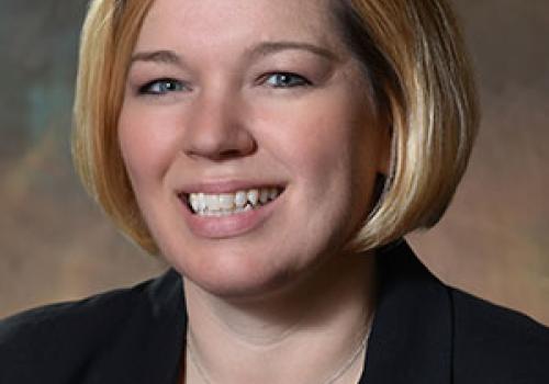 a woman smiling for the camera