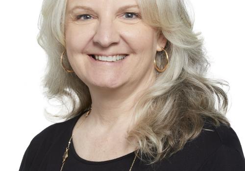 a woman smiling for the camera