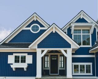 a house in front of a building