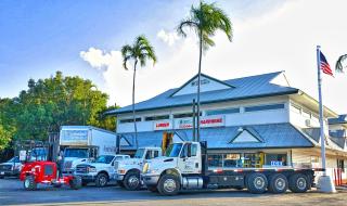 a truck is parked in front of a building