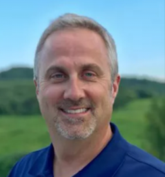 a man smiling for the camera