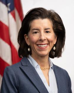 Gina Raimondo smiling for the camera