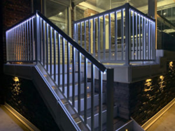 a building with a metal railing