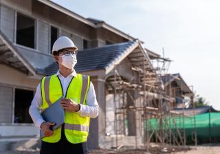 a person standing in front of a building