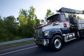 a truck that is driving down the road