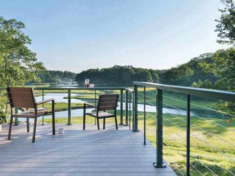 a bench next to a body of water