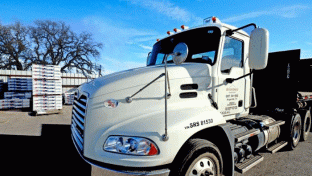 a truck is parked in a parking lot