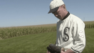 a man standing on a baseball field